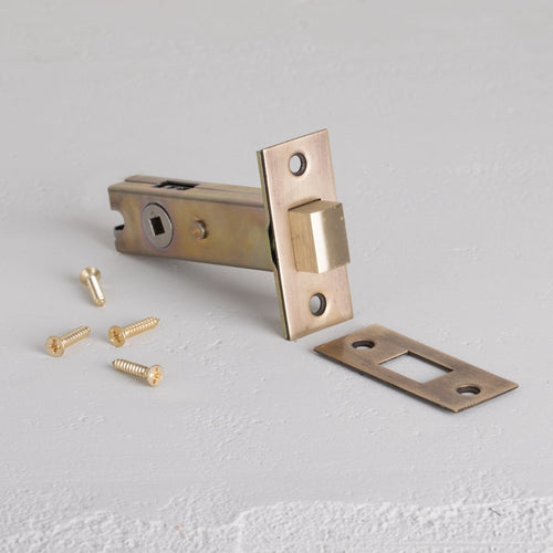 Antique Brass Bathroom Lock 60mm on White Background