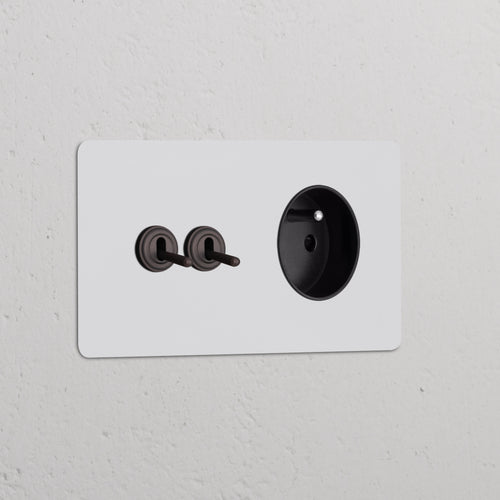 Kew Double 2x Toggle Switch & French/Belgian Type E Socket - Paintable Bronze | Black