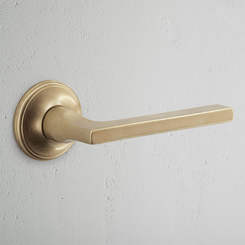Clayton Sprung Door Handle - Antique Brass