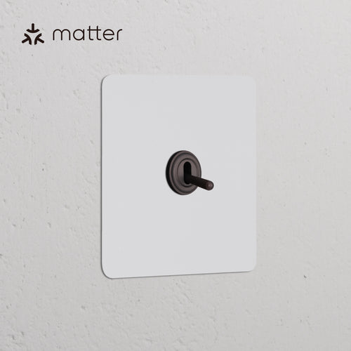 Single Smart Retractive Toggle Switch – Paintable Bronze